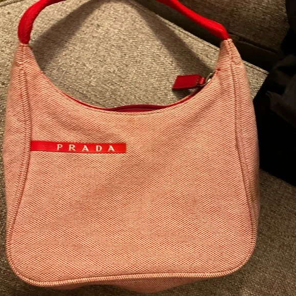 Prada bag
Several small stains on bag. - Picture 2 of 2